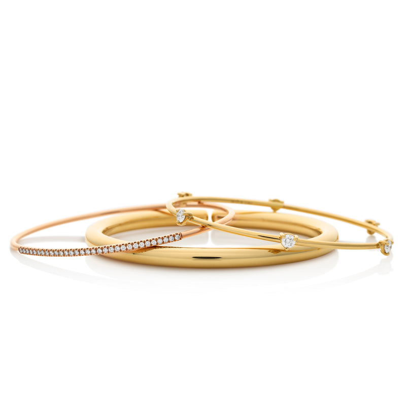 d'Oro gold diamond bangles with flexible gold technology