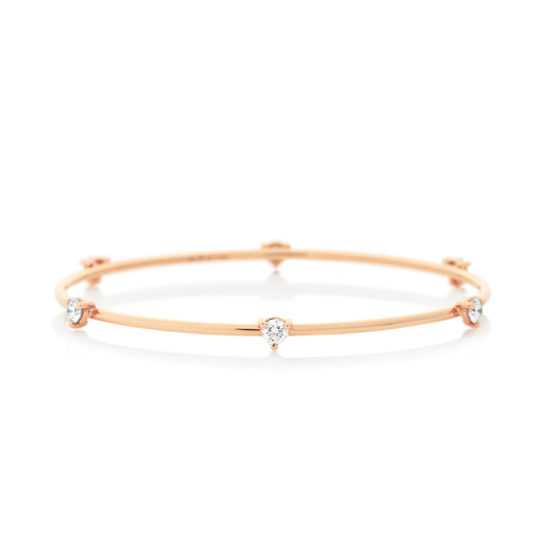 d'Oro 18 karat rose gold diamond drop bangle from NOA fine jewellery