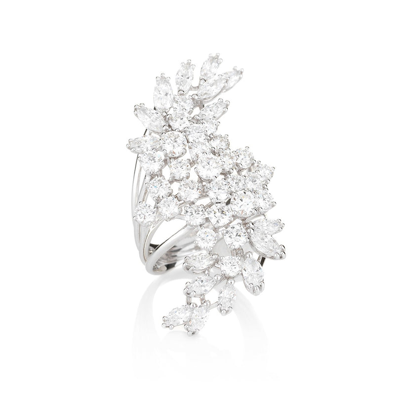 4 white gold rings fan open to hold a stunning cluster of round and marquise-cut diamonds in the NOA Icons diamond ring
