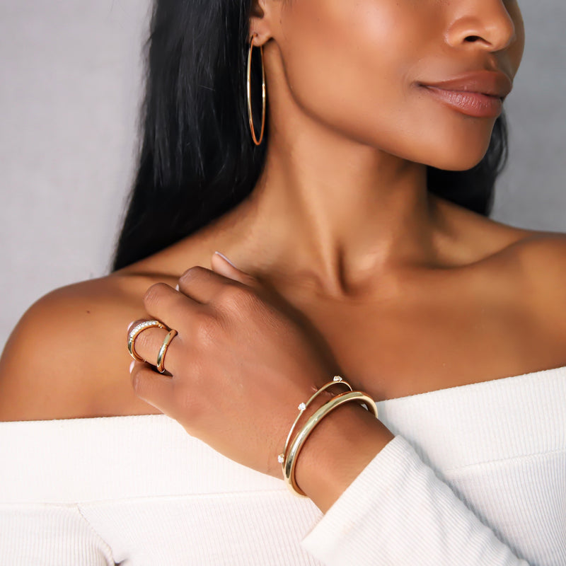 d'Oro yellow gold hoops from NOA fine jewellery
